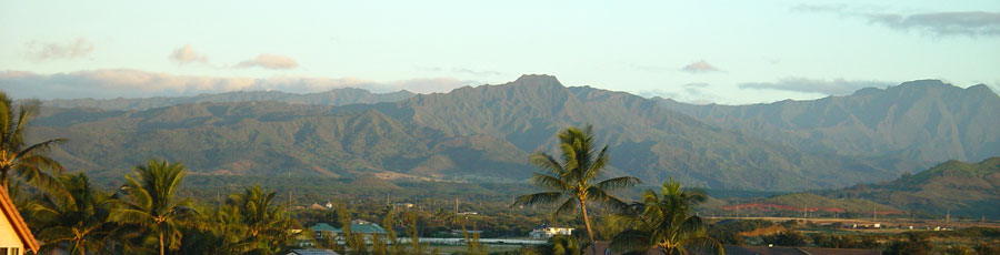 North - view distant Kahili Peak mountain ranges in the fore front and Waialeale in the distance while having meals on the lanai.